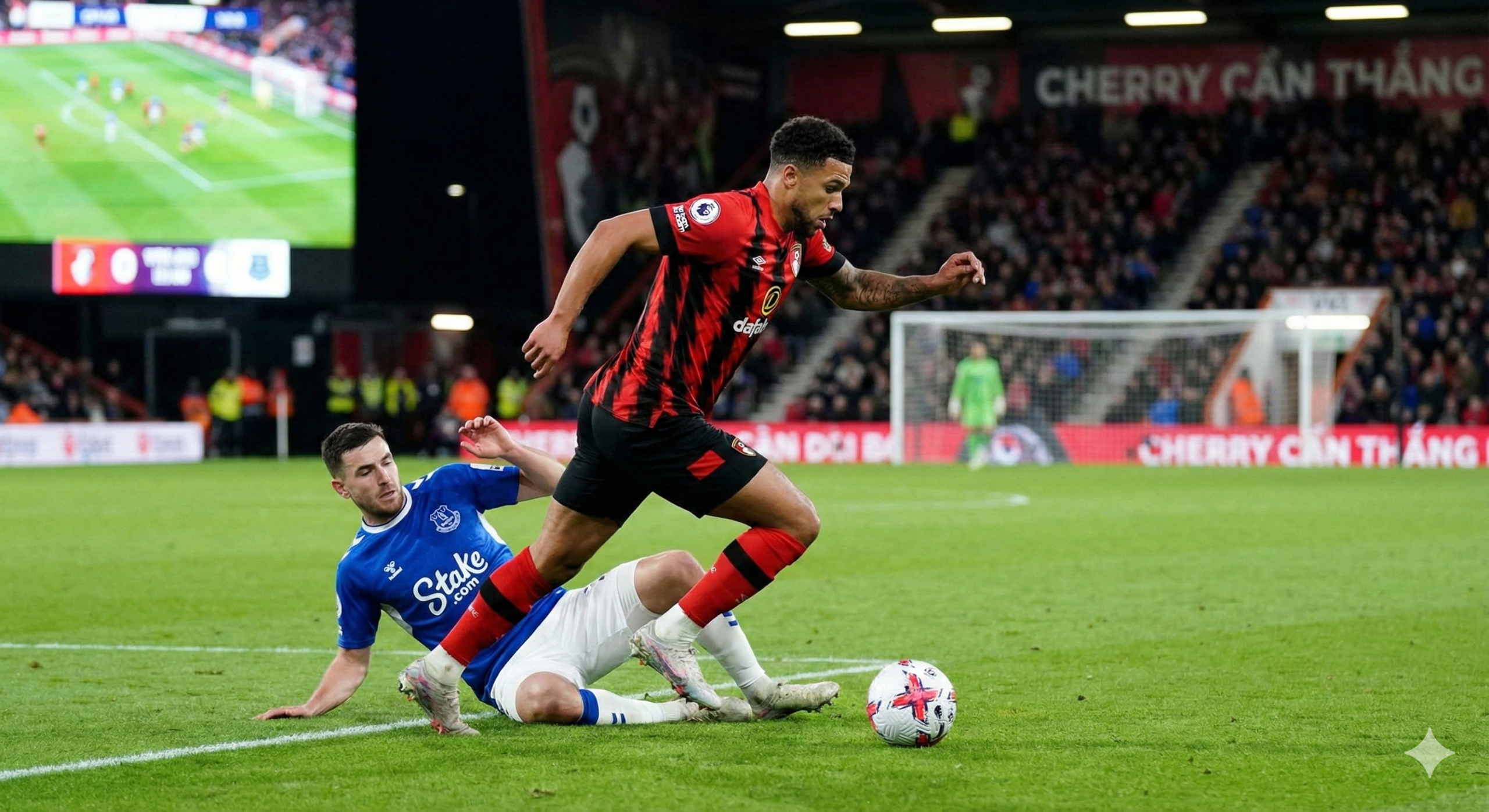 A dynamic action shot inside a football stadium, focusing on Bournemouth's determination to win. The image shows a player in a red and black striped kit dribbling the ball with intensity and speed, moving towards the goal, while an Everton defender in a blue kit attempts to block him. The perspective is from a low angle on the pitch, highlighting the players' athleticism and the green texture of the grass. The background shows blurred stadium crowds and night lighting, emphasizing the focus on the attacking play. The style is professional sports photography with high contrast and sharp details.
